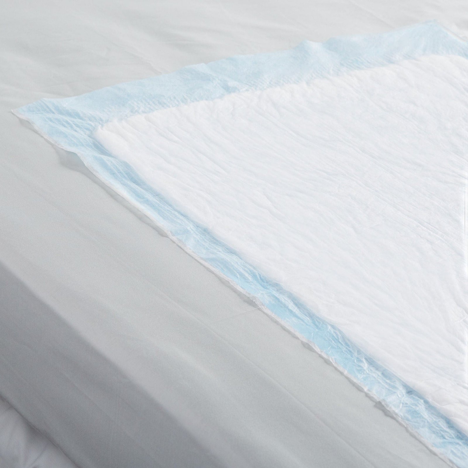 Underpad Simplicity™ Basic 23 X 36 Inch Disposable Fluff Light Absorbency 406849 - 7176 406849 – 7176 - Image 4